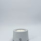 Refillable concrete candle with minimalist lid, handmade in Provence
Indoor concrete candle with soft natural fragrance, refillable and handmade in Provence, perfect for home decor — Siwa Candles.